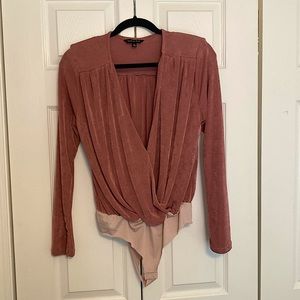 Strut and bolt pink body suit.